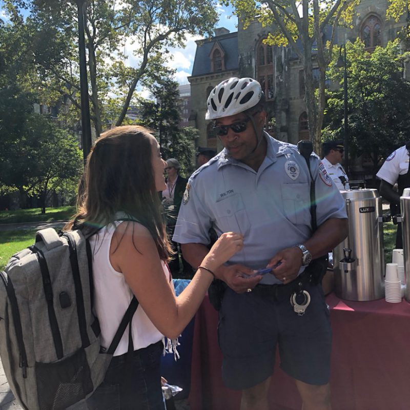 Police Officer chatting with a student