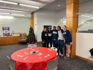 students meet with PAL members to play games and enjoy pizza