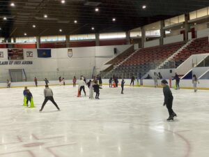 Photo of participants skating inside the Penn Ice Rink 