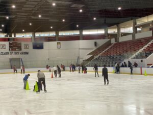 Photo of participants skating inside the Penn Ice Rink 