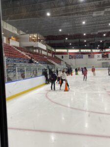 Photo of participants skating inside the Penn Ice Rink 