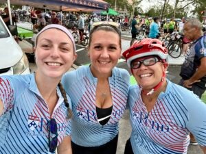 team riders in Penn Public Safety jerseys pose before the race