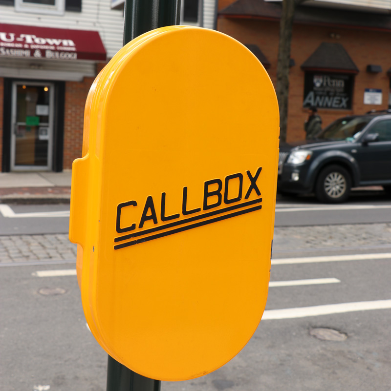 Bright yellow oval shaped box with the lettering